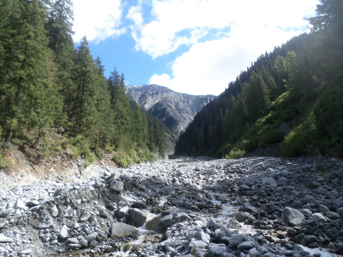 Pika Creek is the first creek which the trail crosses. The creek is subject to unpredictable small rockslides. Do not camp in this area.